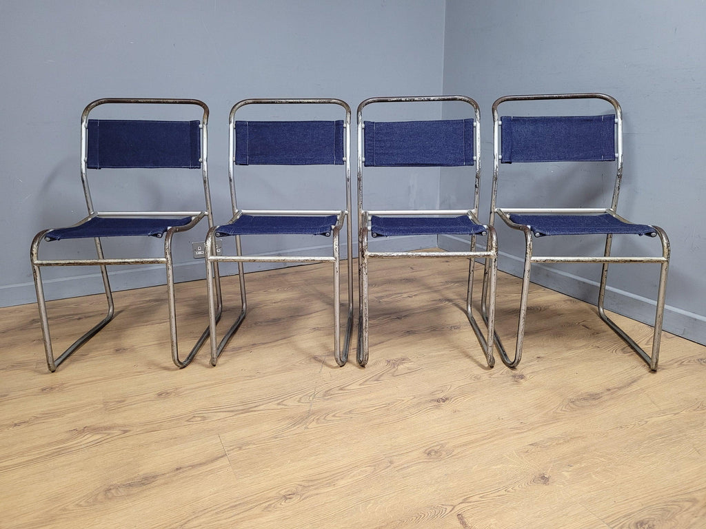 Four Mid Century Pel Cox Industrial Tubular Metal Stacking Chairs Denim Seats