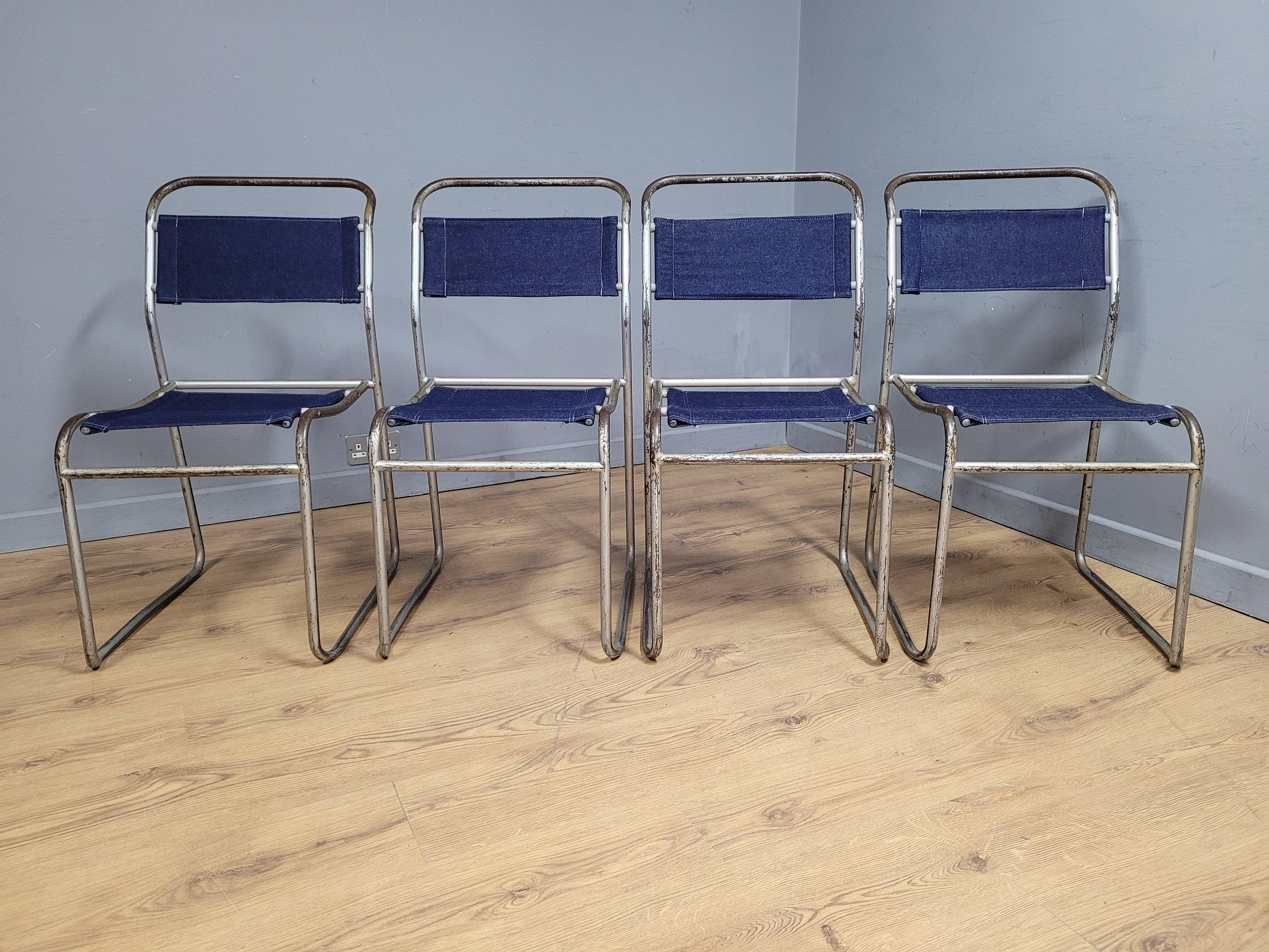 Four Mid Century Pel Cox Industrial Tubular Metal Stacking Chairs Denim Seats