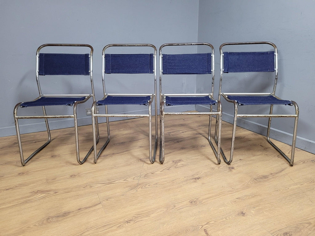 Four Mid Century Pel Cox Industrial Tubular Metal Stacking Chairs Denim Seats