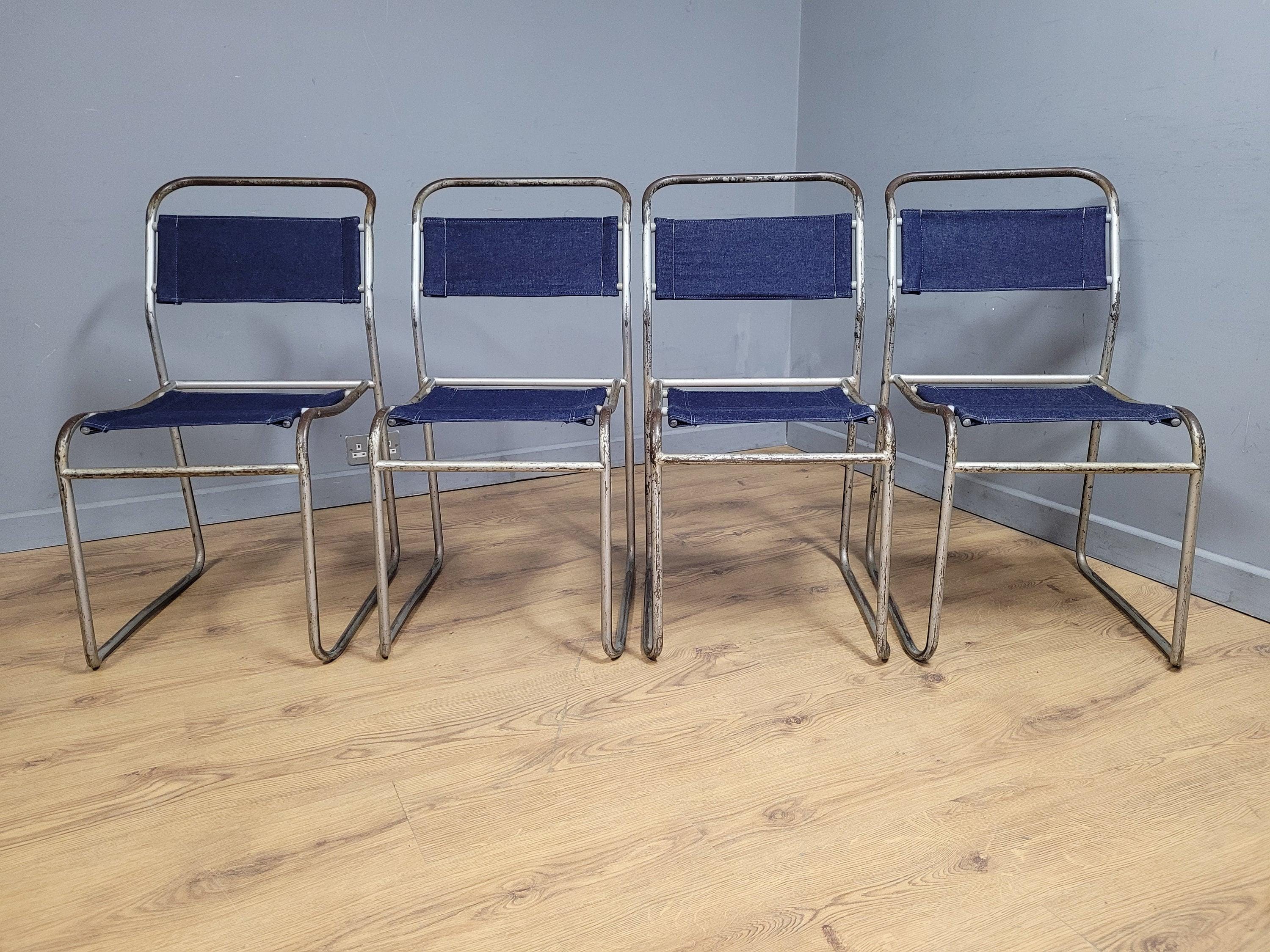 Four Mid Century Pel Cox Industrial Tubular Metal Stacking Chairs Denim Seats