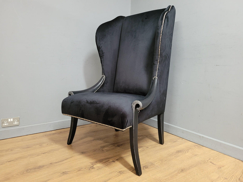 Stylish Upholstered Black Velvet Wingback Armchair Scrolled Arms Chrome Studs