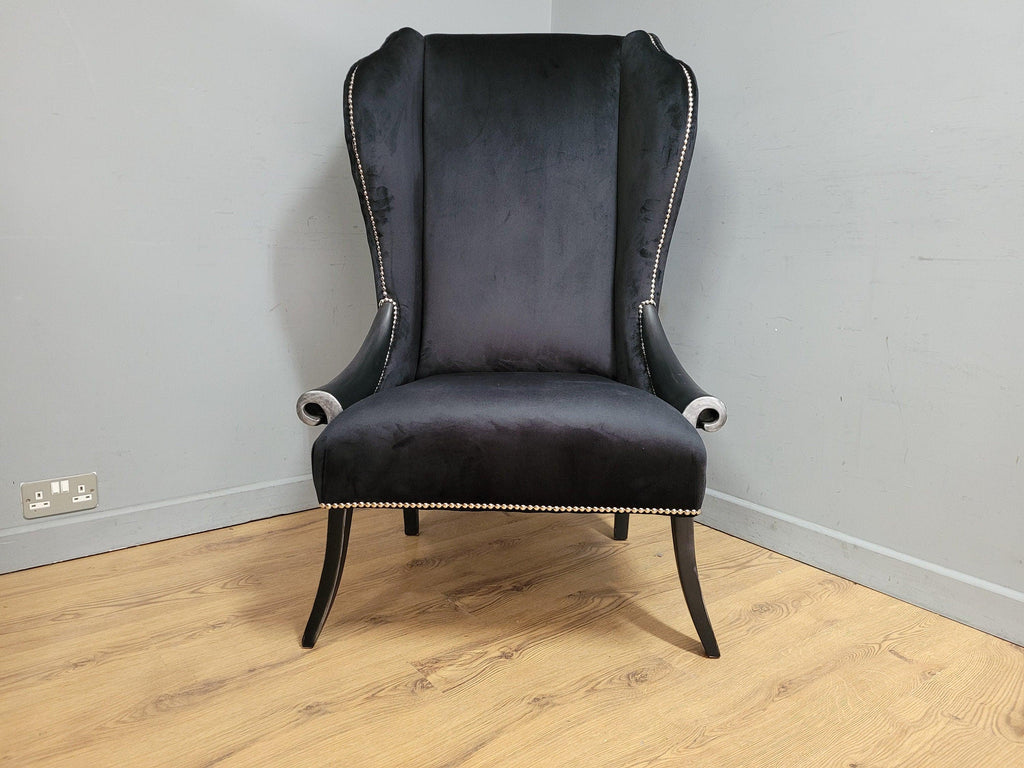 Stylish Upholstered Black Velvet Wingback Armchair Scrolled Arms Chrome Studs