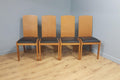 Four High Back Black Leatherette Dining Chairs