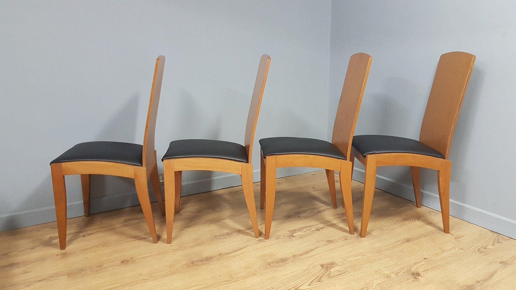 Four High Back Black Leatherette Dining Chairs