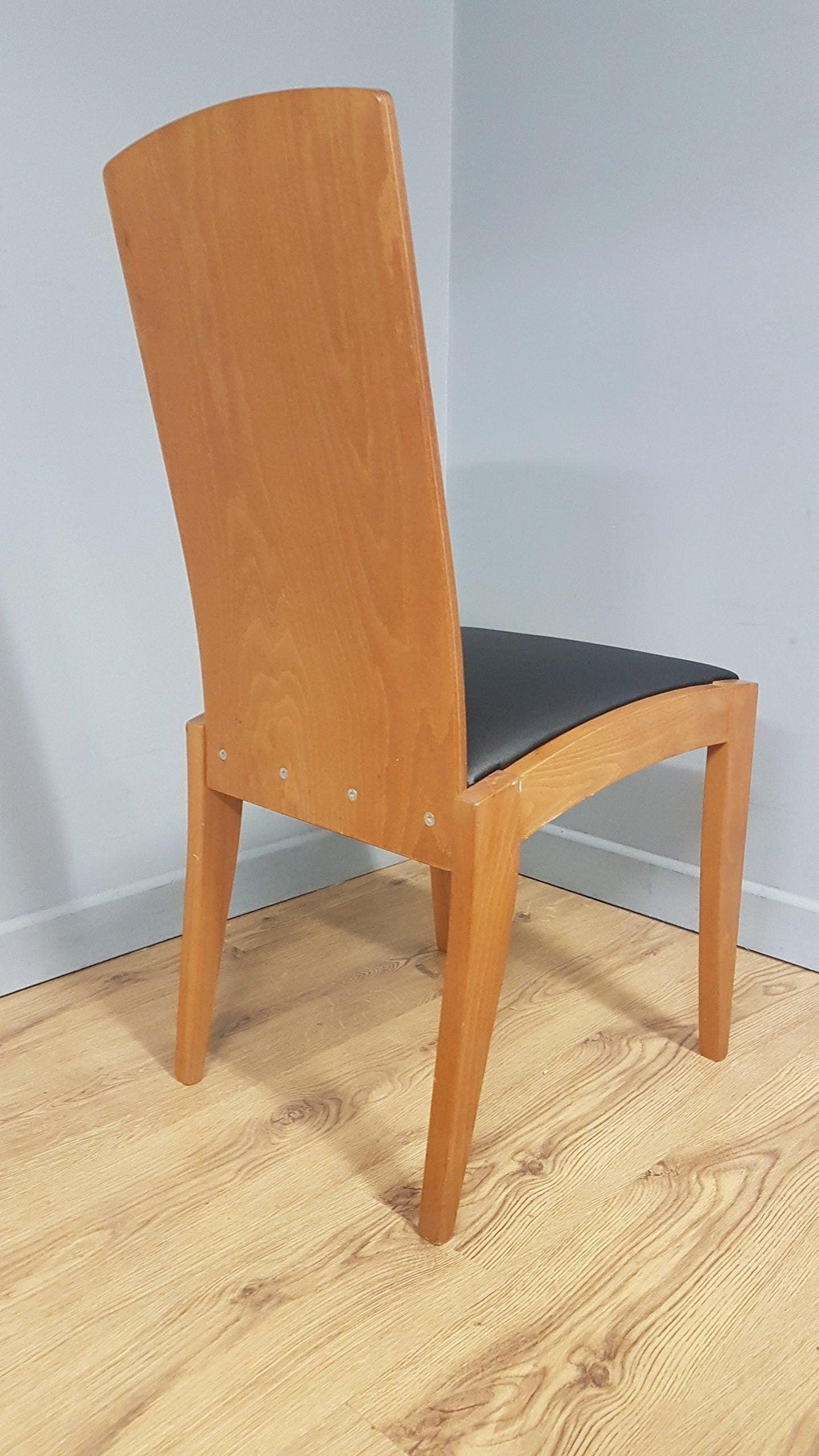 Four High Back Black Leatherette Dining Chairs