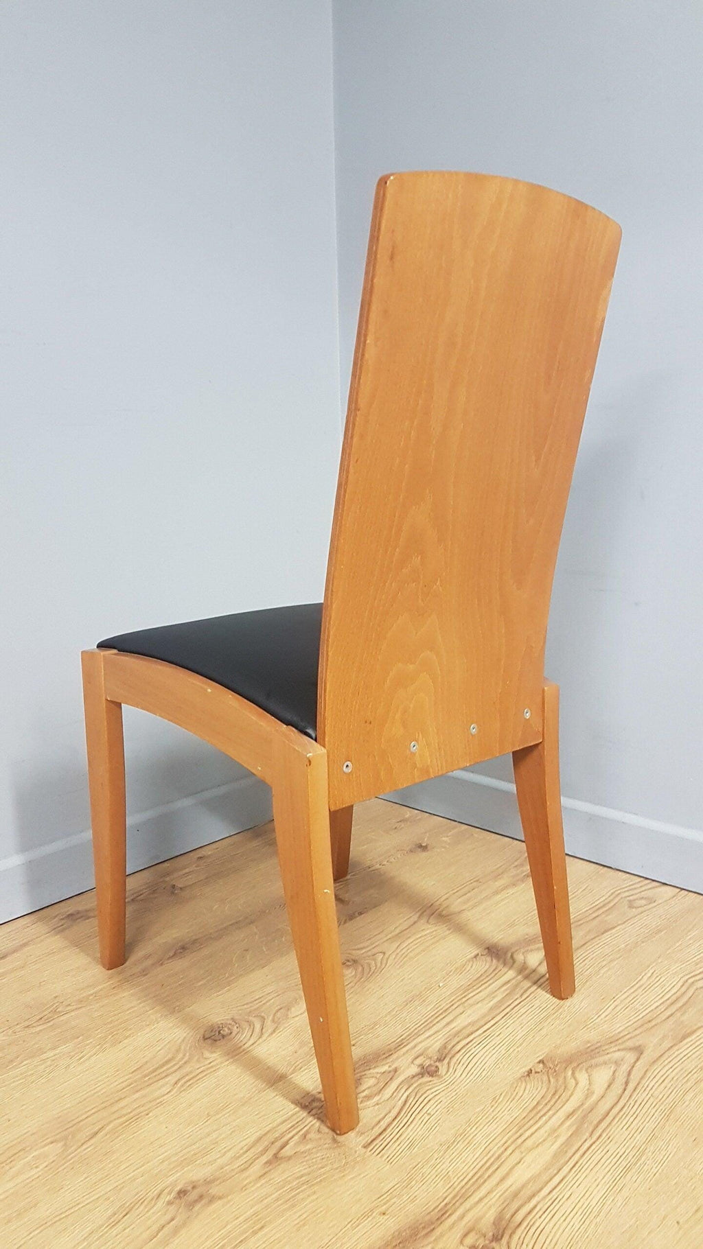 Four High Back Black Leatherette Dining Chairs