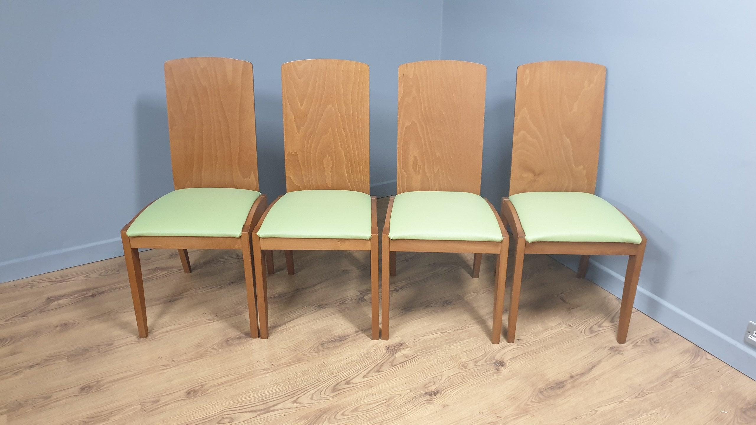 Four High Back Olive Green Leatherette Dining Chairs