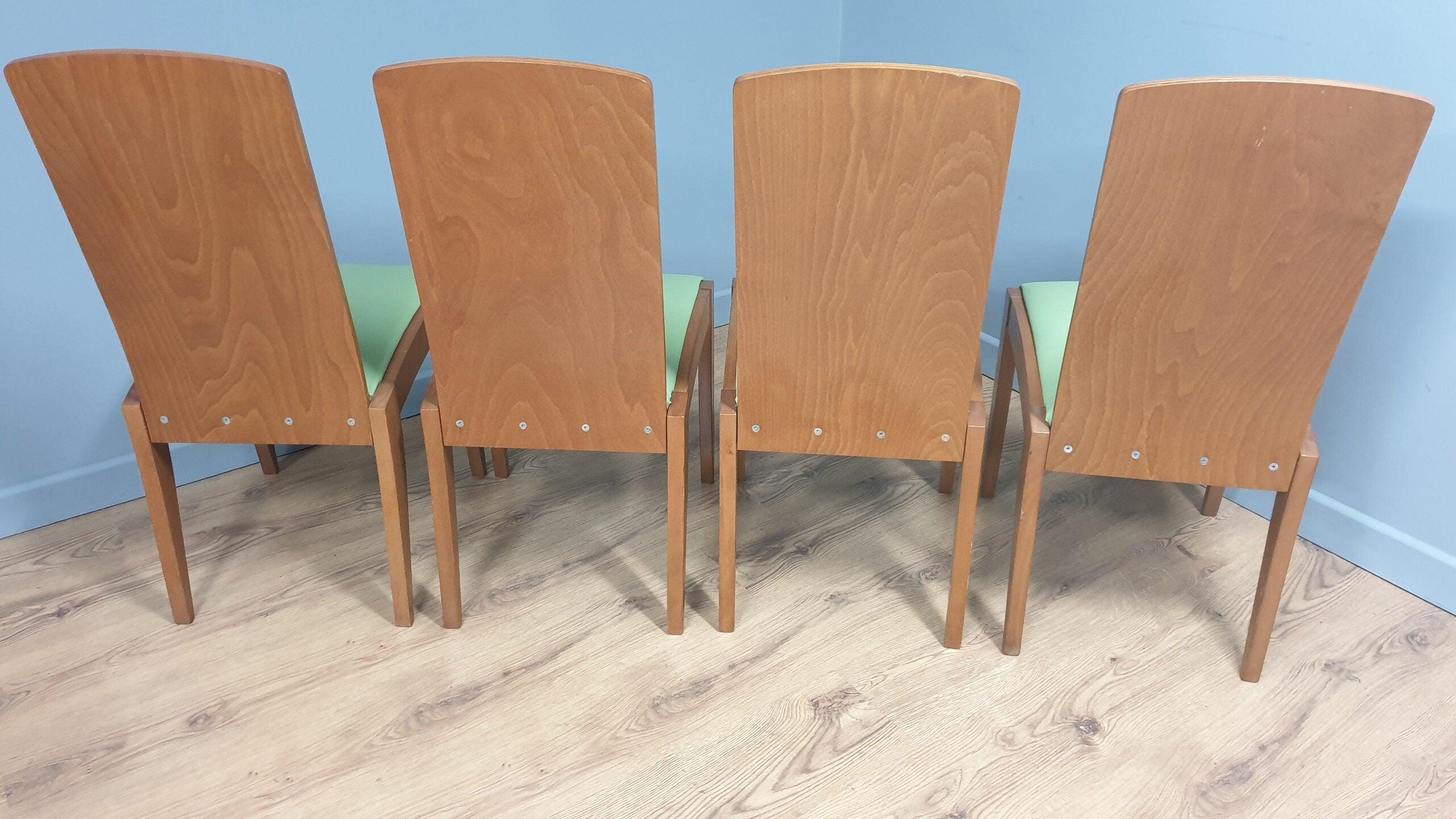 Four High Back Olive Green Leatherette Dining Chairs