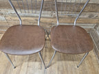 Four Retro Chrome Bistro Stacking Chairs Faux Tan Leather Seats Tubular Legs