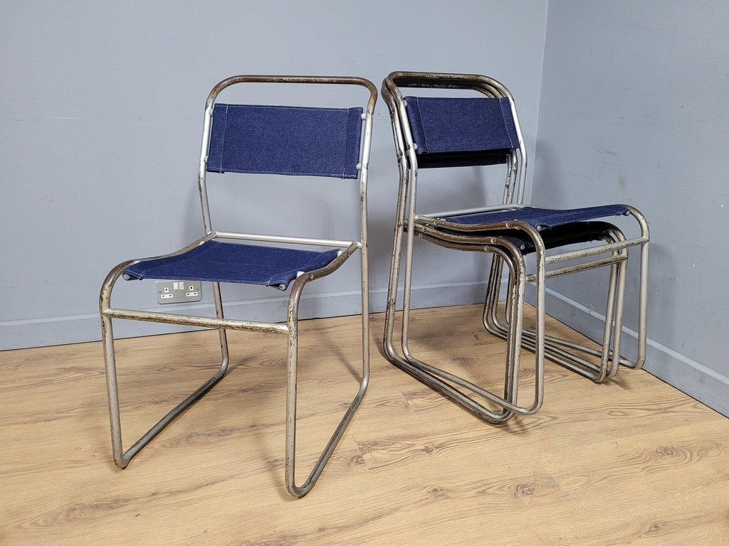 Four Mid Century Pel Cox Industrial Tubular Metal Stacking Chairs Denim Seats