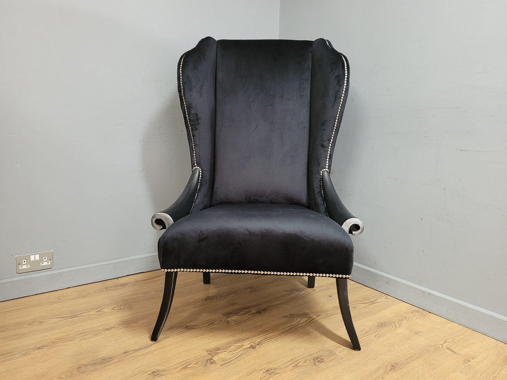 Stylish Upholstered Black Velvet Wingback Armchair Scrolled Arms Chrome Studs