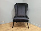 Stylish Upholstered Black Velvet Wingback Armchair Scrolled Arms Chrome Studs