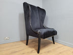 Stylish Upholstered Black Velvet Wingback Armchair Scrolled Arms Chrome Studs