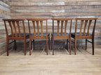 Four Danish Influenced Teak Ladder Back Mid Century Dining Chairs Black Vinyl