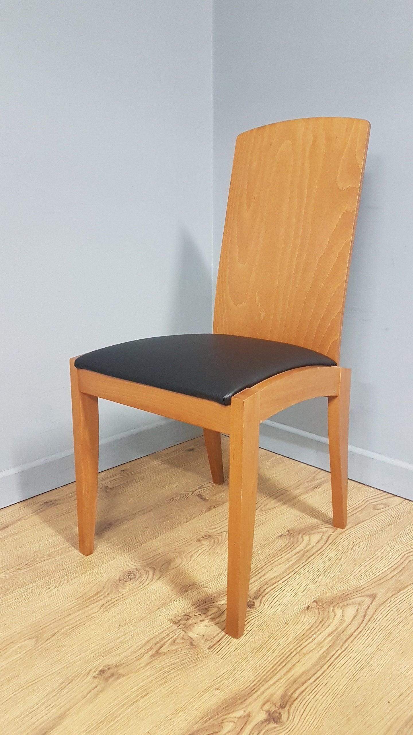 Four High Back Black Leatherette Dining Chairs