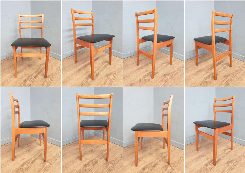 Two Mid Century Danish Influenced Teak Style Black Vinyl Pad Dining Chairs