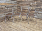 Four Retro Chrome Bistro Stacking Chairs Faux Tan Leather Seats Tubular Legs