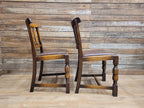 Pair Oak Arts & Craft Influenced Chairs Vintage Carved Back Padded Seats