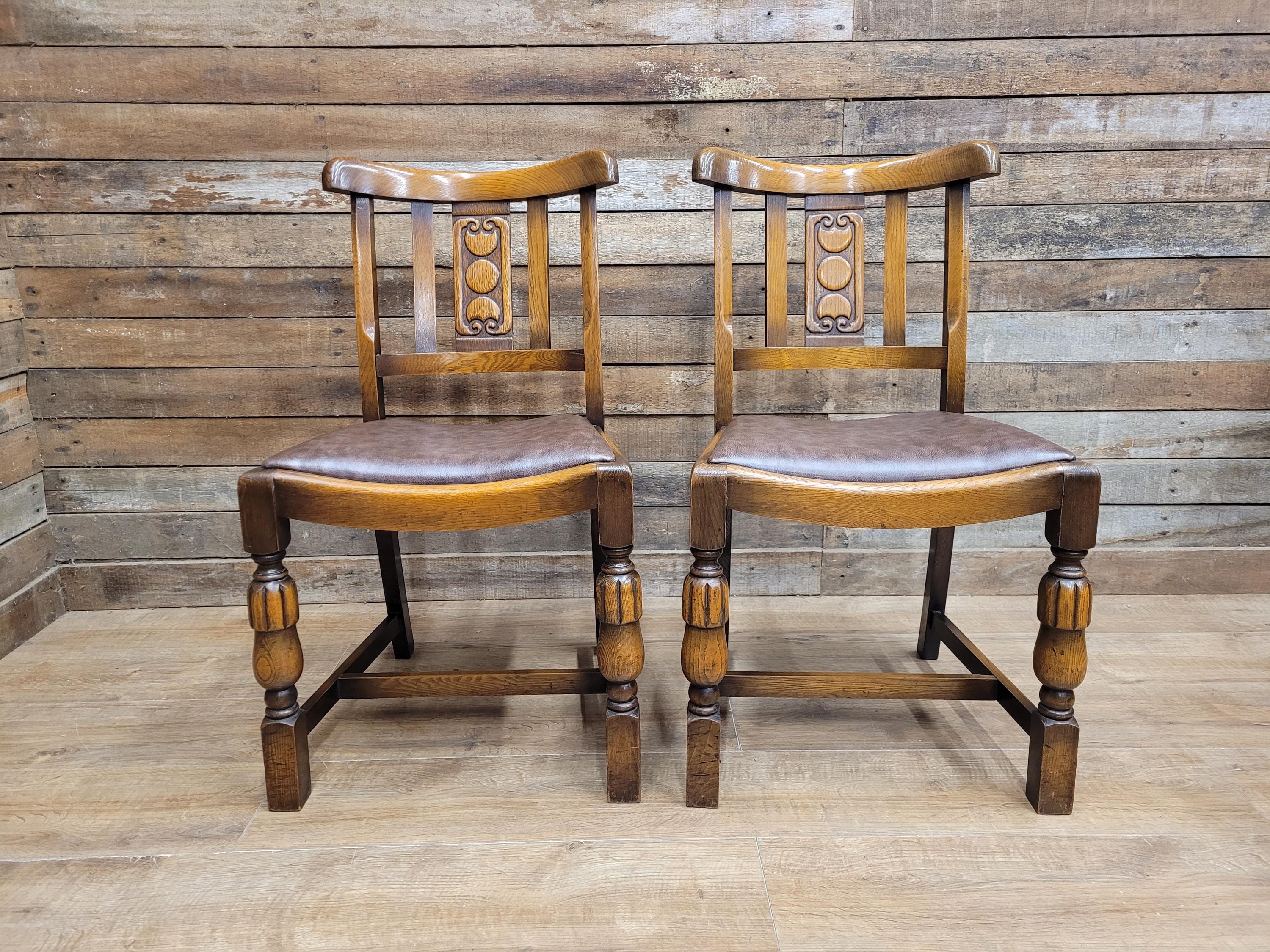 Pair Oak Arts & Craft Influenced Chairs Vintage Carved Back Padded Seats
