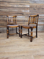 Pair Oak Arts & Craft Influenced Chairs Vintage Carved Back Padded Seats