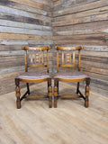 Pair Oak Arts & Craft Influenced Chairs Vintage Carved Back Padded Seats