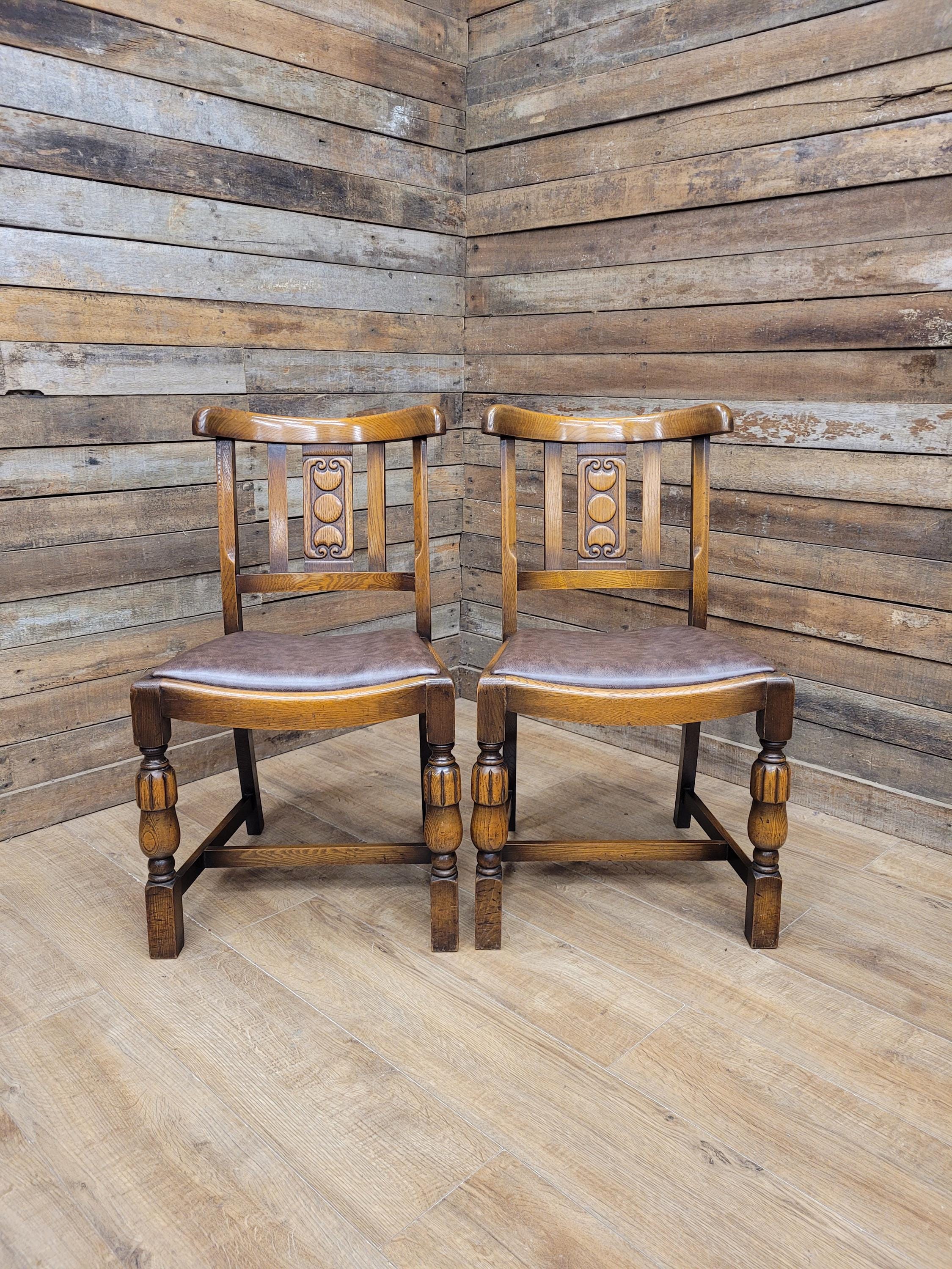 Pair Oak Arts & Craft Influenced Chairs Vintage Carved Back Padded Seats