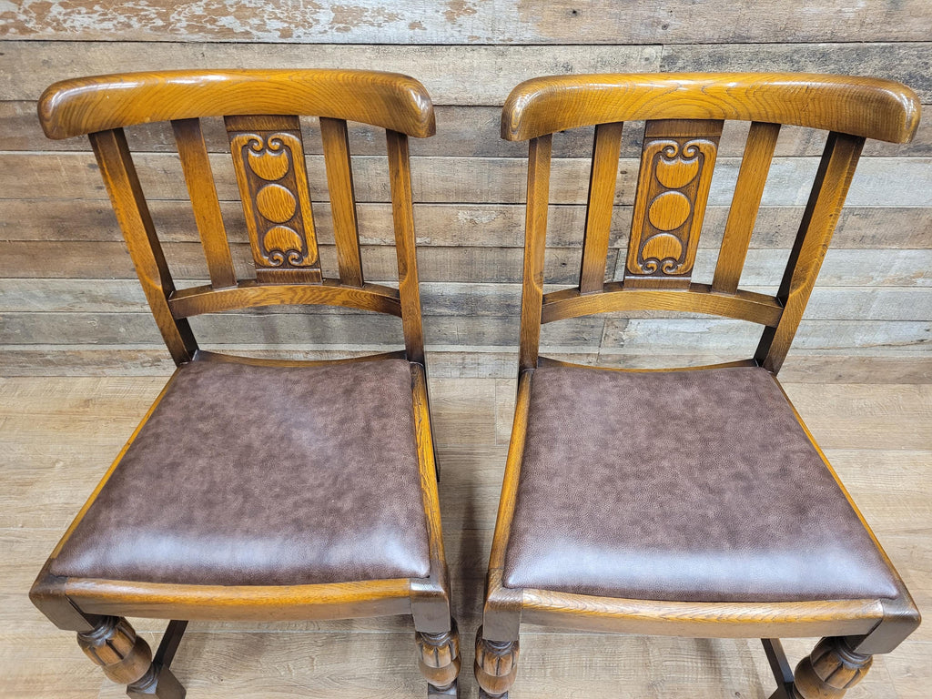 Pair Oak Arts & Craft Influenced Chairs Vintage Carved Back Padded Seats
