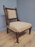 Edwardian Armchair Mahogany Open Arm Turned Legs Castors Upholstered