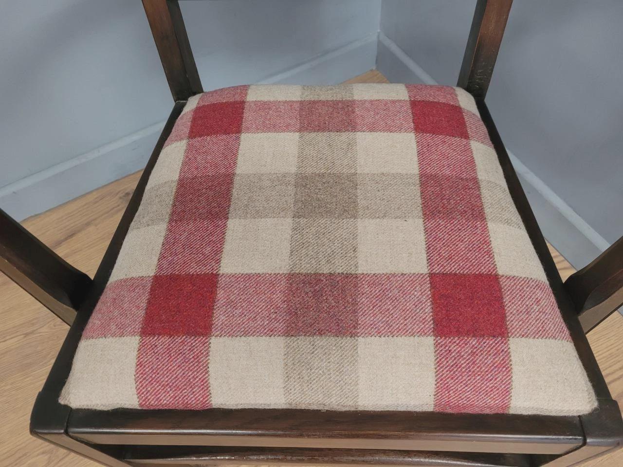 Ercol Colonial Armchair Carved Back New Wool Seat