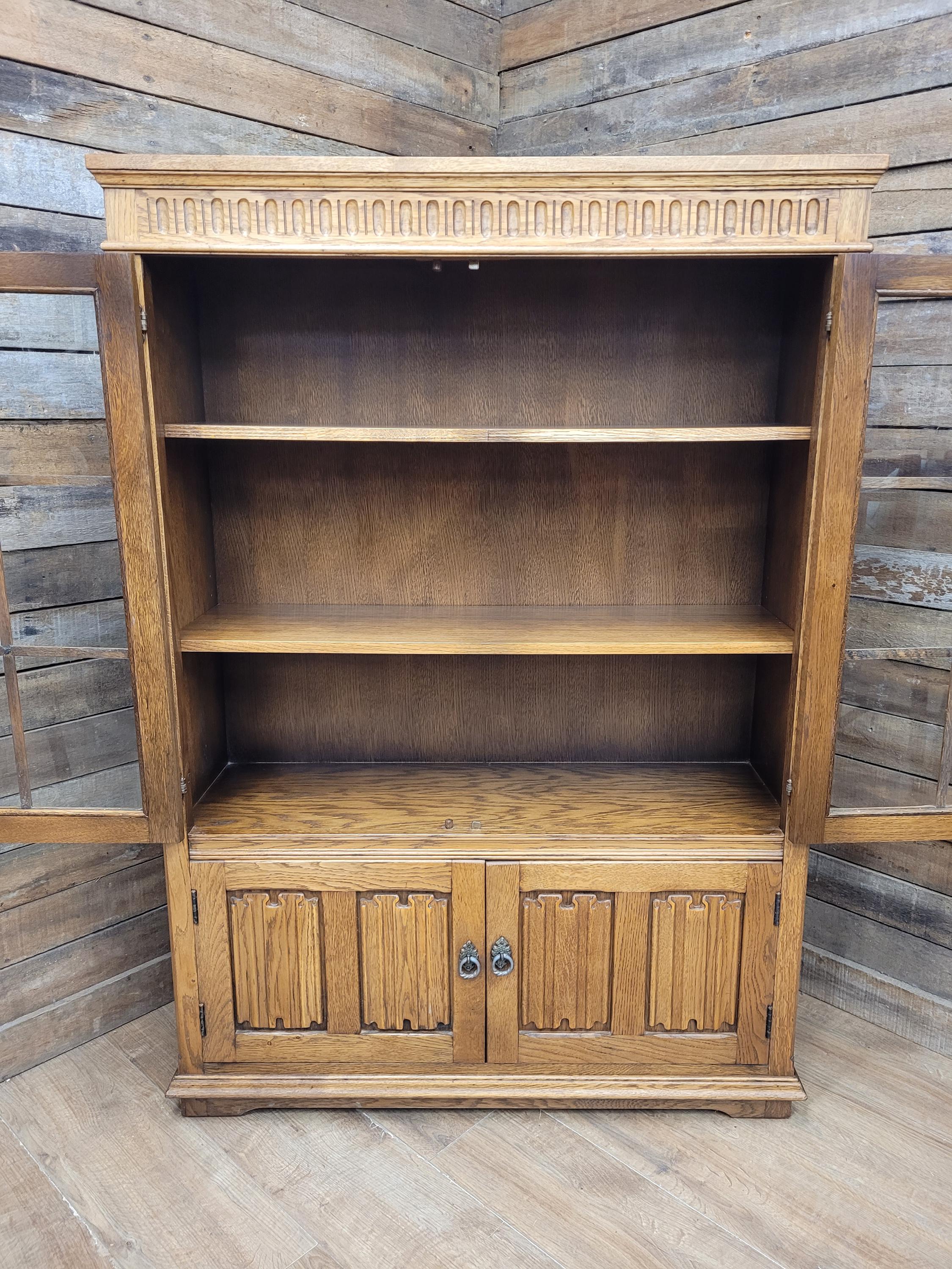 Jacobean Style Oak Bookcase Cabinet Glazed Doors Carved Panels Full Of Old Charm
