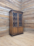 Oak Glazed Bookcase Leaded Glass Jacobean Revival Linen Fold Cabinet