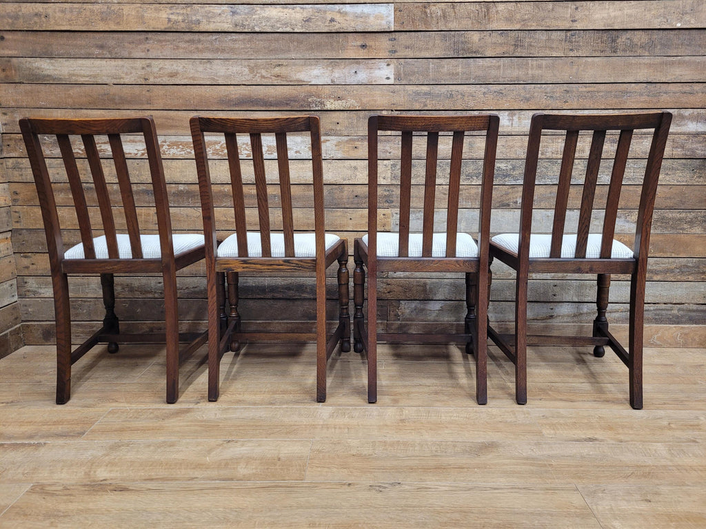 Set Of Four Oak Dining Chairs Neutral Chenille Upholstered Seats