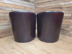 Pair Brown Faux Leather Tub Chairs With Matching Footstools
