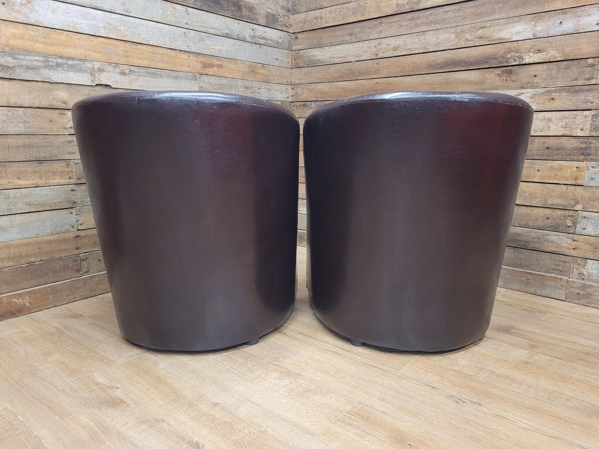 Pair Brown Faux Leather Tub Chairs With Matching Footstools