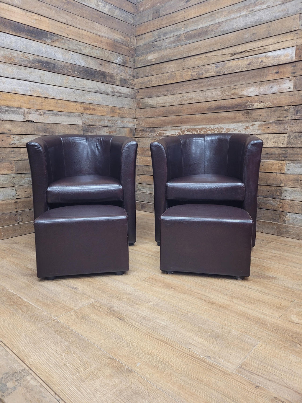Pair Brown Faux Leather Tub Chairs With Matching Footstools