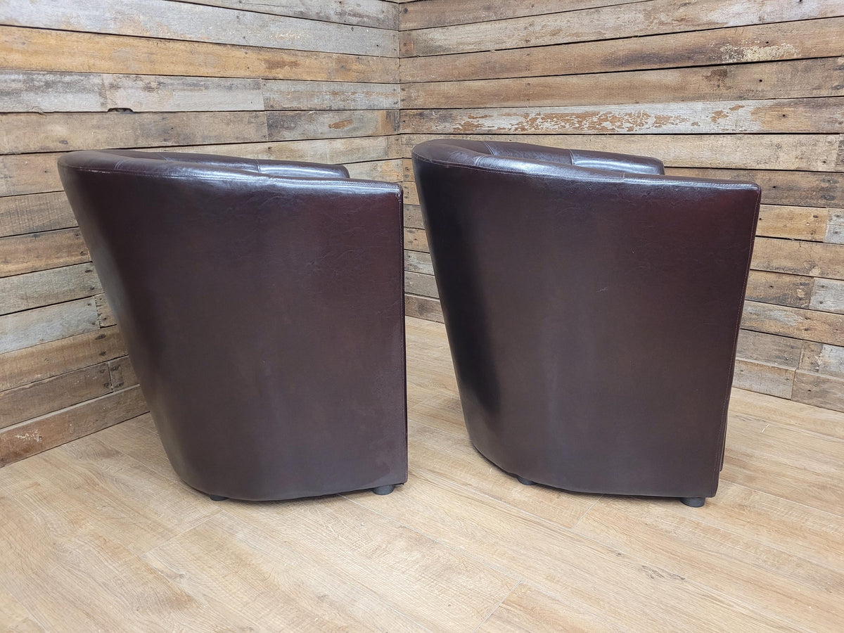 Pair Brown Faux Leather Tub Chairs With Matching Footstools